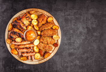 Variety of meat products including ham and sausages.