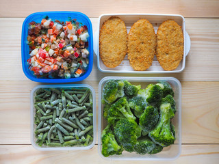 Frozen food. Vegetables on the freezer shelves. Stocks of meal for the winter.
