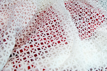 crinkled pattern textile with white en red color wavy background
