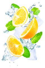Flying Orange slices water splashes, ices and mint leaves