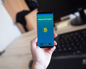 Man using smart phone with interface app on screen for mock up presentation on custom background