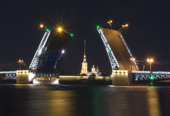 Fototapeta na wymiar Drawn Palace Bridge and Peter and Paul Fortress at white night, Saint Petersburg, Russia