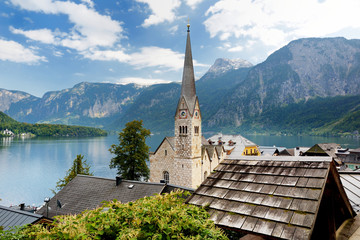 Scenic view of Hallstatt lakeside town in the Austrian Alps on beautiful day in autumn. Hallstatt, situated on Hallstatter See, a market town in the district of Gmunden.