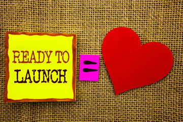 Handwriting text showing Ready To Launch. Business concept for Prepare New Product Promotion Start Release written on Stiky Note Paper Meaning Love For on the textured background