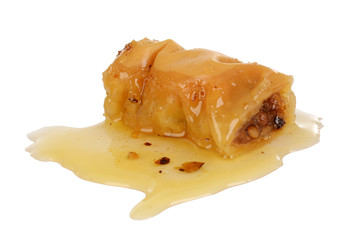 Sweet dessert roll baklava in sugary syrup