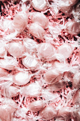 Pile of small pink sugar candies 