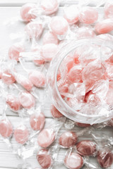 Pile of small pink sugar candies 