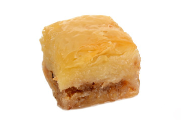 Traditional oriental dessert baklava with syrup, isolated