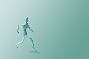 Fototapeta na wymiar Blue Wooden mannequin in a running pose. Wooden model on the run. Morning running, training. Jogging. The figure of wood runs on a blue pastel background. Caring for physical condition.