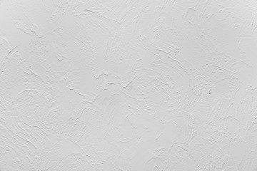 Sample of relief decorative plaster on the wall, interior, natural color without color toning, not finished, loft and hi-tech style