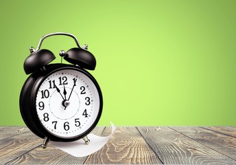 Retro alarm clock on table
