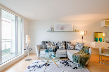 Modern bright living room in a luxury house. Interior design.