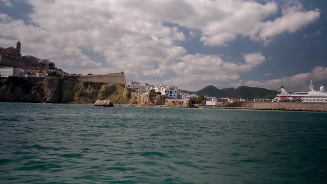 view of ibiza town from a boat out at sea