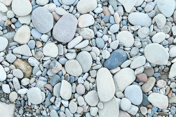 large grey pebble occupies the entire space of the frame, grey tone