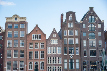 Traditional dutch buildings on canal in Amsterdam