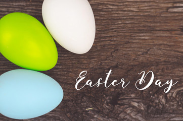 Easter eggs in wood  against background. Spring holidays concept