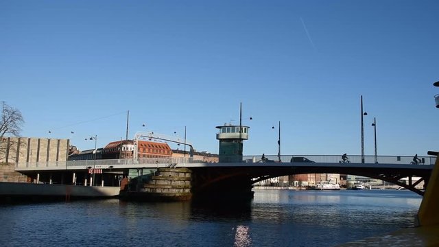 Canal view of bridge and houses in Copenhagen, Denmark