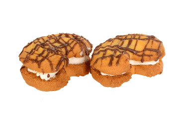 Sandwich cookies, moon shape filled with vanilla cream