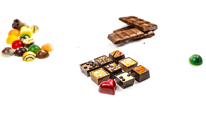 Colorful designer chocolates with a stuffing