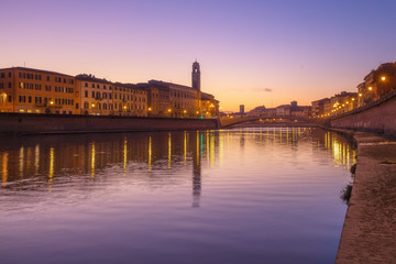 Pisa, Arno river, Ponte di Mezzo bridge. Lungarno sunset view. Tuscany, Italy