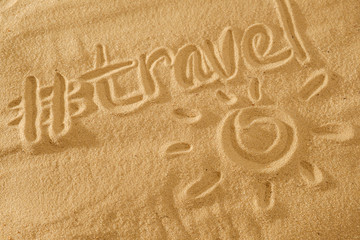 written words travel with sun sign and beam on sand of beach wave background