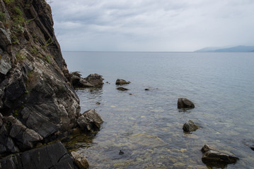 Lake Baikal. Rocky shore on a summer day