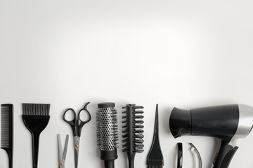 Professional hairdresser tools on white background