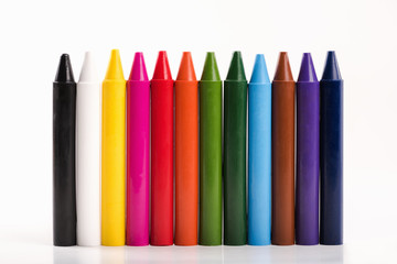Multicolor crayons isolated on white background.