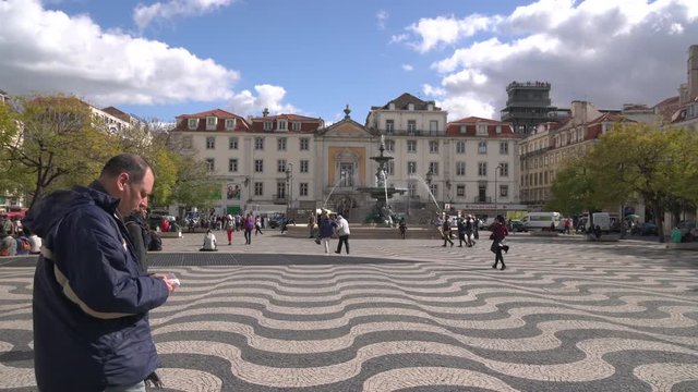 Walking in Rossio Square