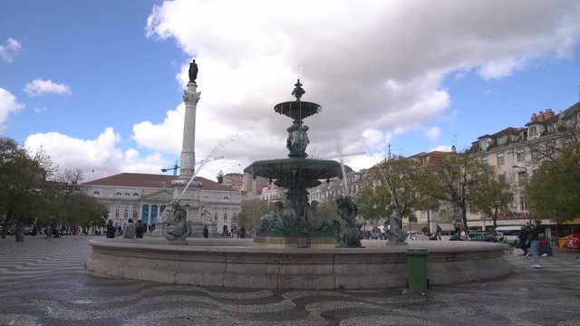 Fountain and statue in Rossio Square