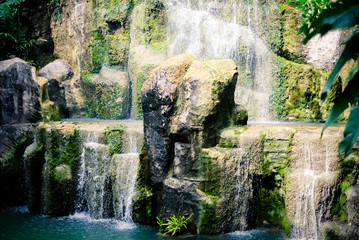 Fototapeta na wymiar Waterfall in the garden,garden simulate natural place.