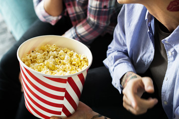 Friends enjoying a movie on friday night