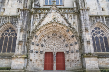 Fototapeta na wymiar Quimper in Brittany, the Saint-Corentin cathedral, beautiful entry porch 