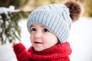 sweet toddler girl in snow 