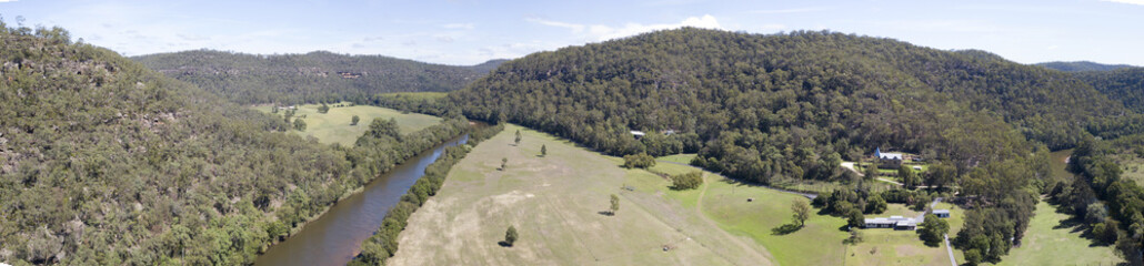 Fototapeta na wymiar Aerial view of the Mcdonald river in the Mcdonald valley near Wisemans Ferry, New South Wales, Australia.