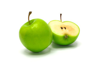 Ripe green apple and half on white background
