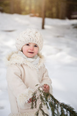 sweet toddler girl in snow 