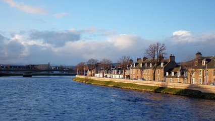 View of Inverness river with old building and blue sky, Scotland, UK