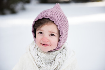 sweet toddler girl in snow 