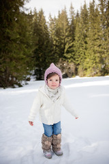 sweet toddler girl in snow 