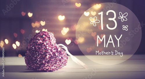 Mother's Day message with a pink heart with heart shaped lights