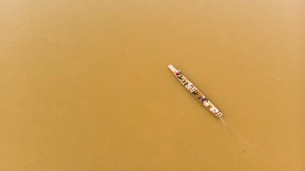 Alone boat in the middle of Kong river.