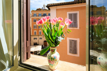 Bouquet of tulips on the background of a city