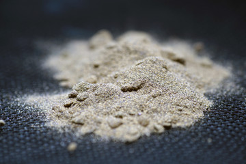 Sodium carbonate is a Chemical powder from the chemistry kit with macro lens photographed in studio

