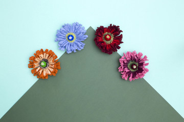 Four brooches from felted wool in the form of a flower