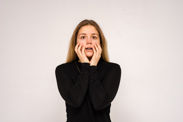 beautiful girl in different poses shows different emotions on different backgrounds in different clothes