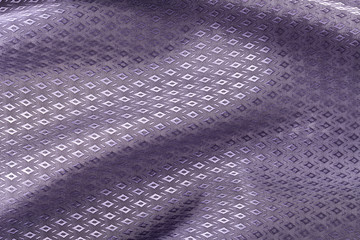 Silk background, texture of violet, diamond pattern shiny fabric