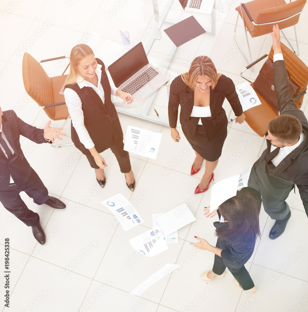 Wall mural view from the top.business team throwing work documents.t