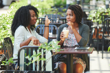 Friends meeting in cafe