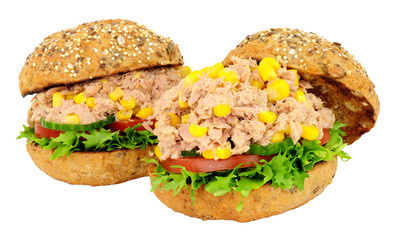 Two tuna fish and sweetcorn sandwich rolls with fresh salad isolated on a white background